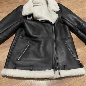 Dan Cassab 100% Shearling jacket in “L” “Large” but best suited for a medium